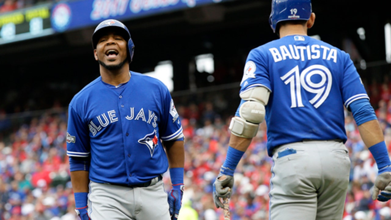 Blue Jays hit 4 home runs, beat Rangers for 2-0 lead in ALDS